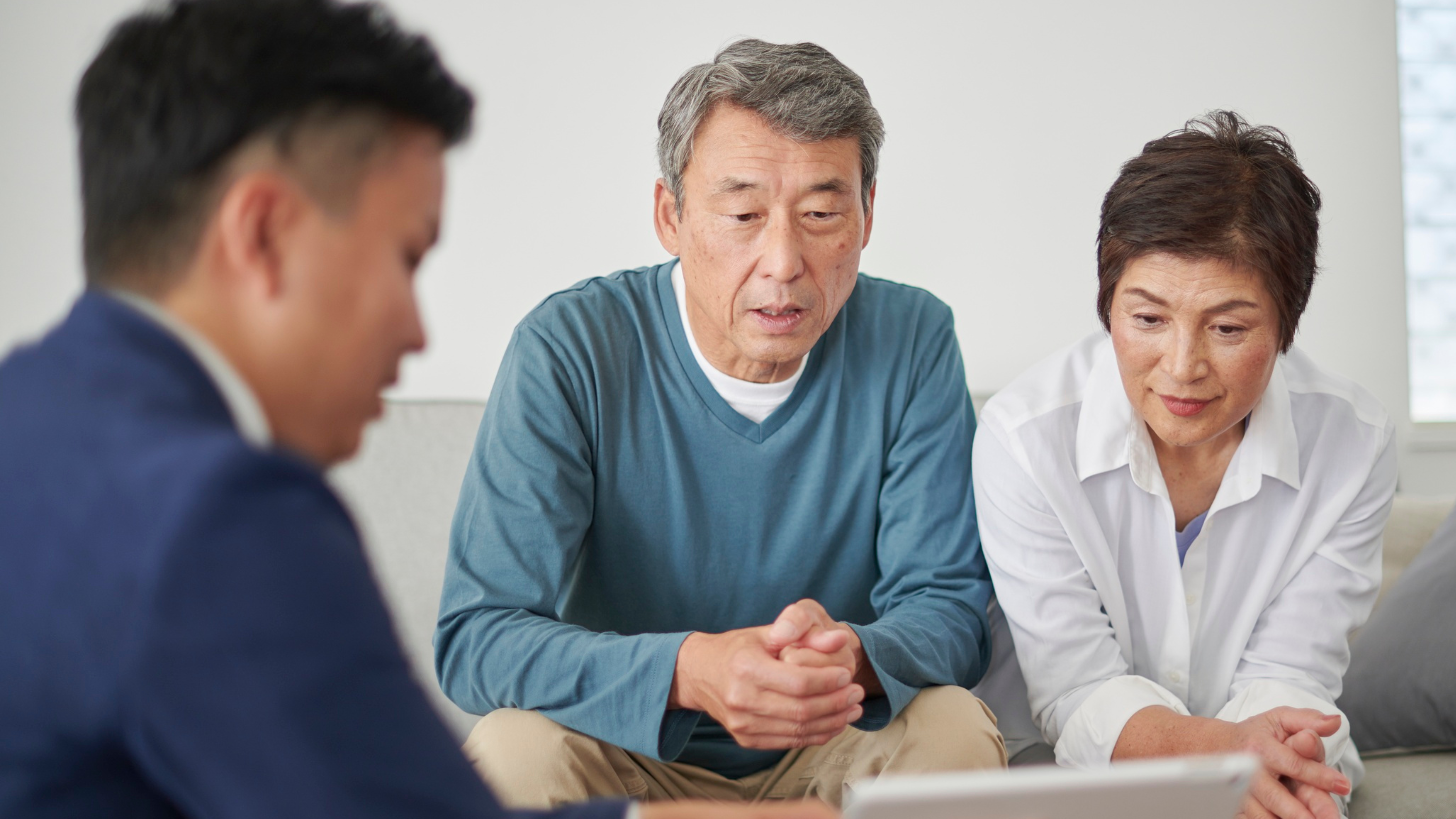 Financial Advisor Speaking with Clients